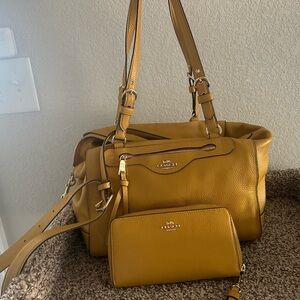 matching mustard yellow coach purse and wallet